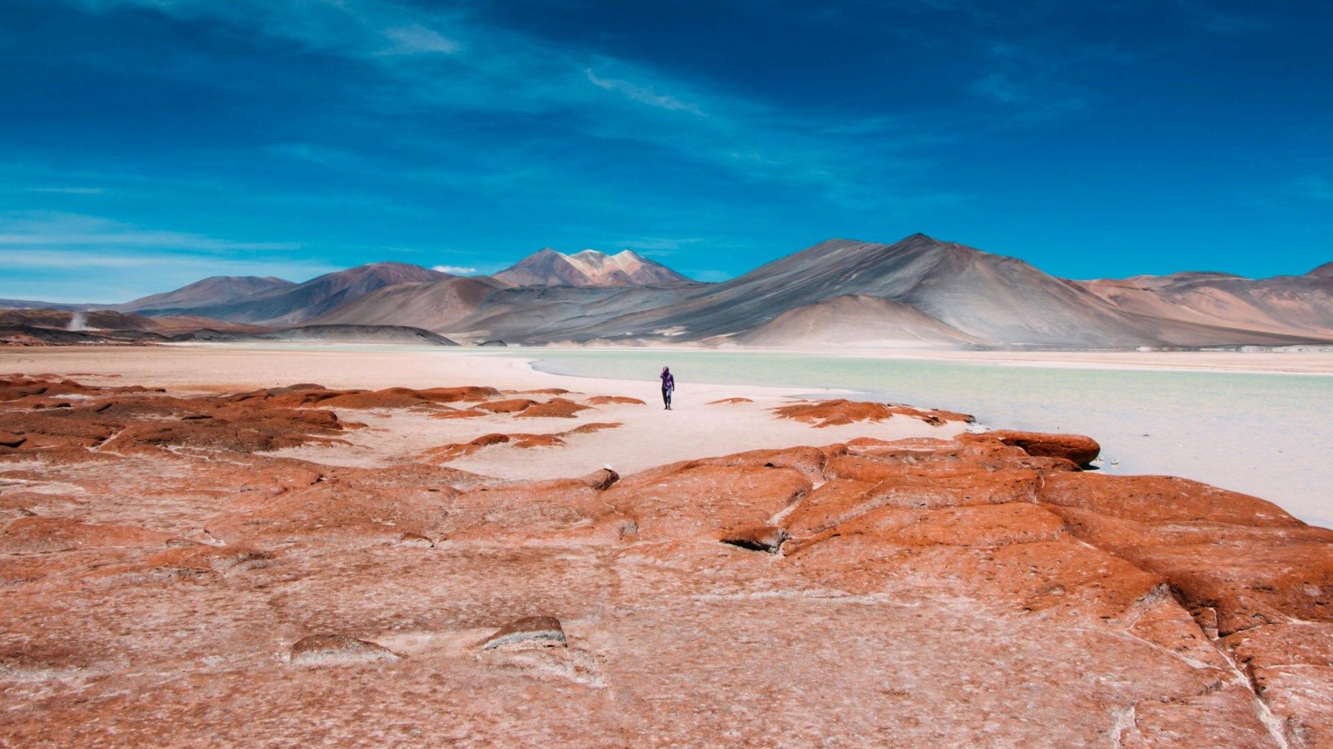 Man standing in the Atacama Desert. 