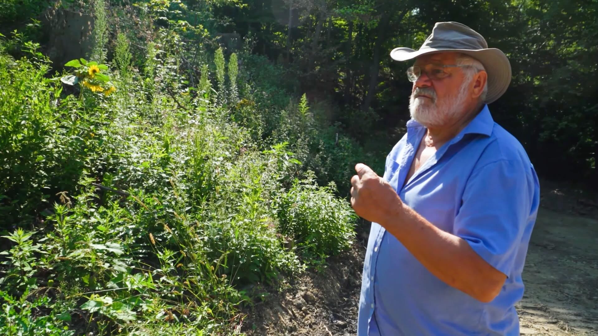 Sepp Holzer outside on his farm. 